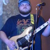 Chuckie Pain – Bass, vocals, percussion