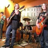(green shirt on the left) Trent Brooks – Bass Trent also played bass in the previous band.